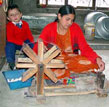 Nepali artisan spinning pashmina yarn