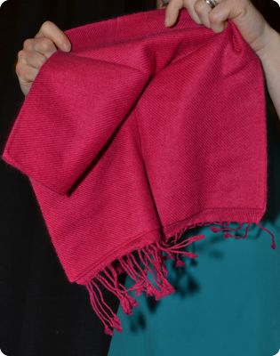 Empar is wearing a Sunrise Pashmina compact muffler, 100% pashmina, Very Berry (#Mctdt-202D)