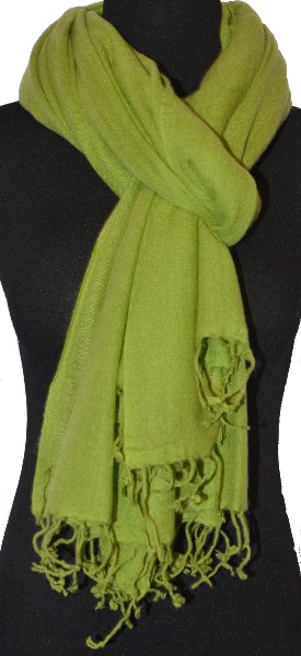 Empar is wearing a full size Sagarmatha shawl in Peridot, SFT-015