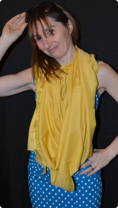 Empar is wearing a medium size Ama Dablam shawl in Mimosa Yellow (#ADmr-189) 