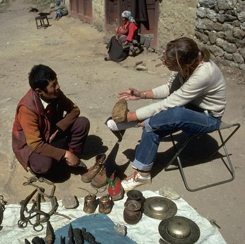 Tourist shopping for Tibetan boots in Namche Bazar