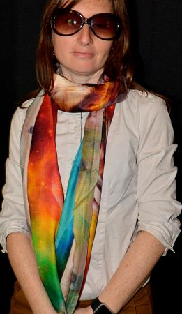 Empar is wearing a colorful Ranghi-Tanghi modal shawl, woven from  semi-synthetic modal yarn derived from broken down and reconstituted plant cellulose